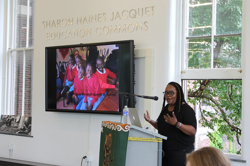 Woman speaking at podium