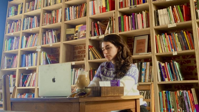 Amanda Cronin preparing lesson plans in a cafe in Argentina