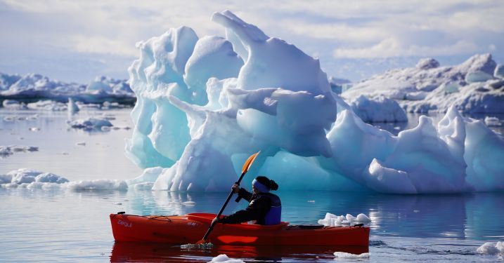 Fulbrighter Kyrin Pollock kayaks among icebergs.