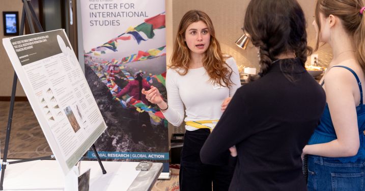 Anastasiia Ryshytiuk '28 speaks to fellow Global Scholars about international financing of climate solutions in Belize.