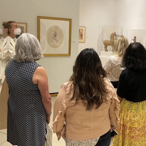 K-12 teachers at Einaudi's International Summer Studies Institute view art on global inequalities at the Johnson Museum.